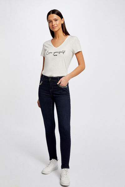 Jeans slim avec poches cloutées jean brut femme