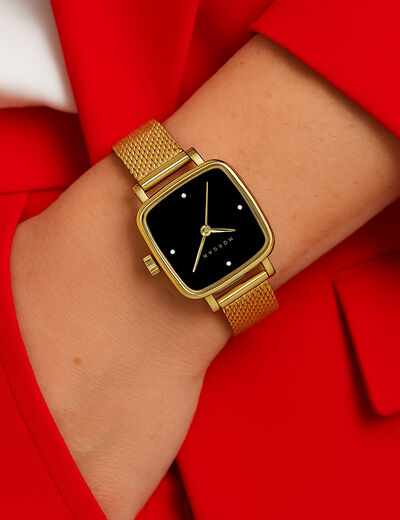 Montre jaune or femme