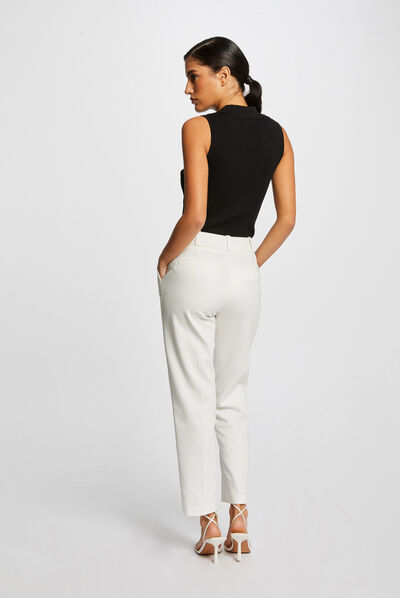 Pull débardeur sans manches col polo noir femme