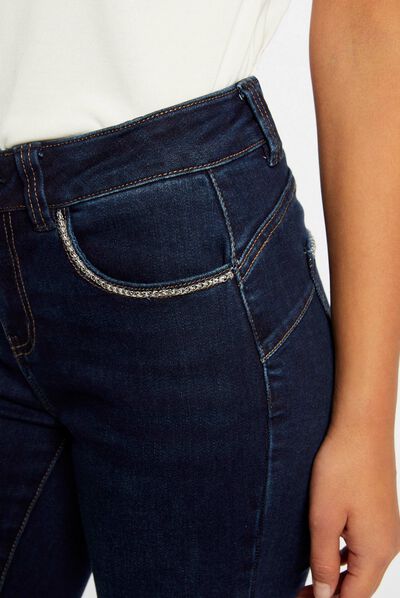 Jeans slim avec détails chaînes jean brut femme
