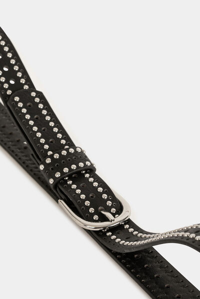 Ceinture avec clous et perforations noir femme