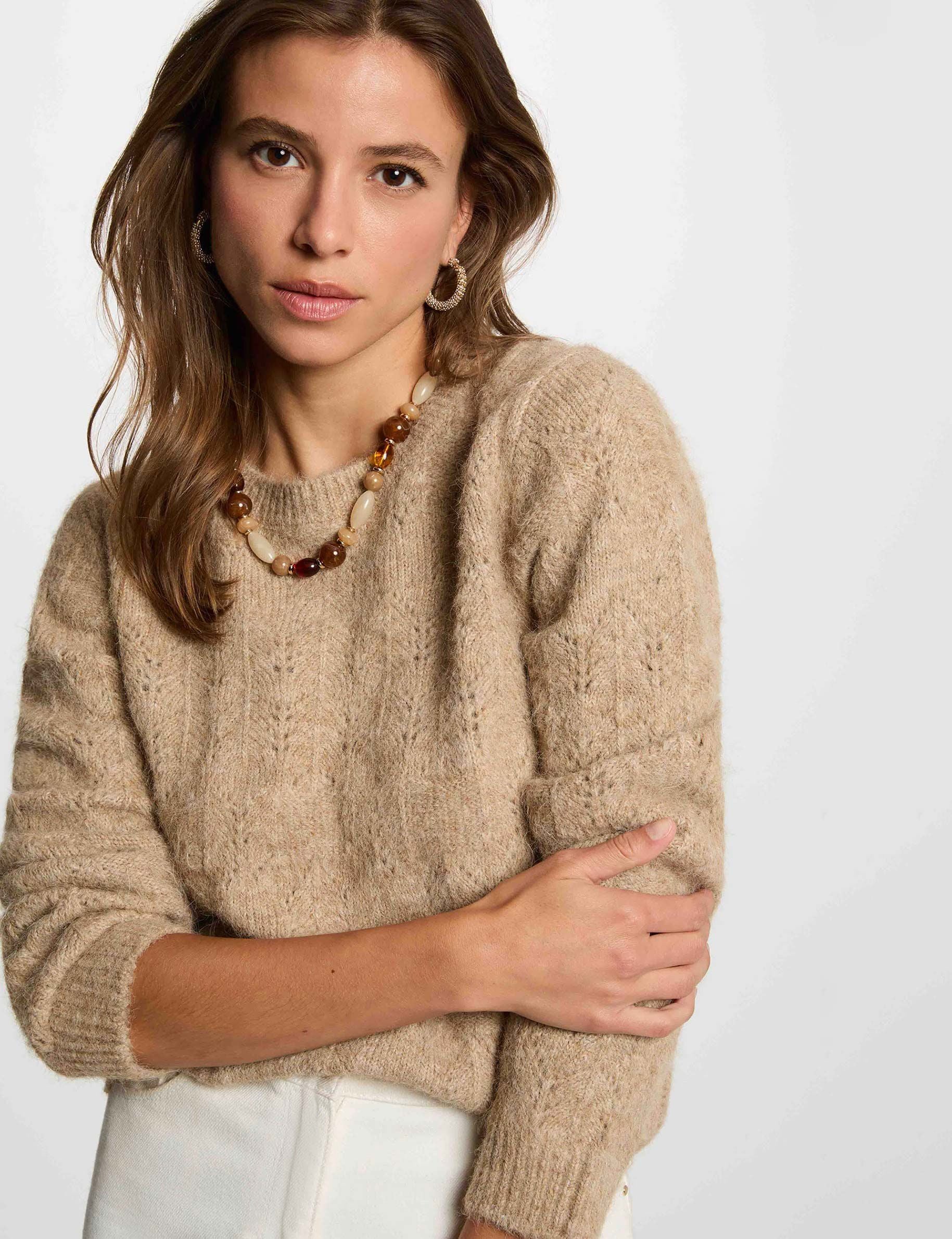Pull ajouré col rond femme