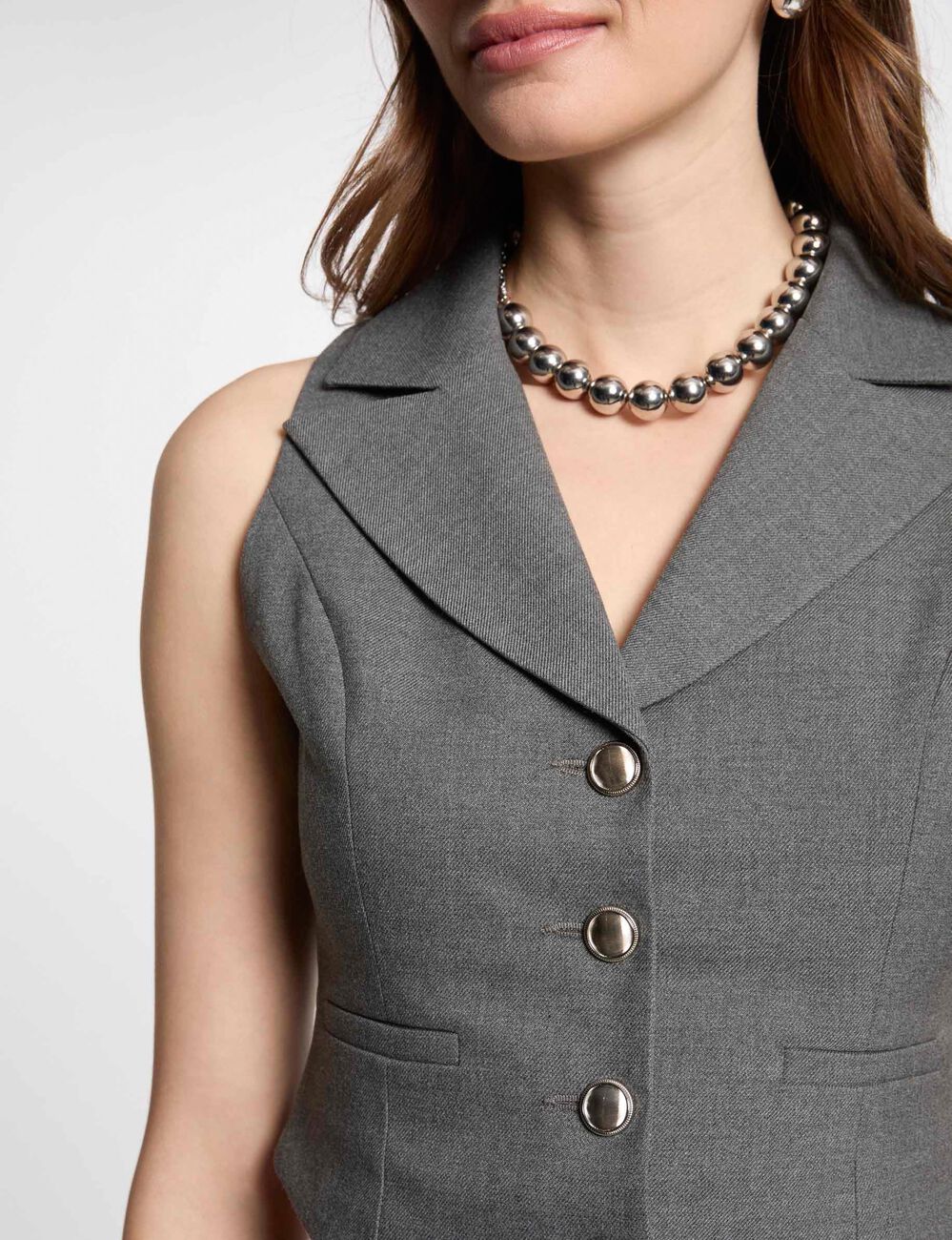 Gilet sans manches ajust&eacute; gris clair femme
