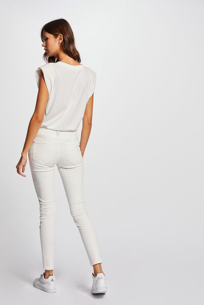 Pantalon skinny avec détails cloutés ecru femme