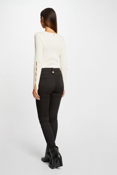 Pantalon skinny avec boutons décoratifs noir femme
