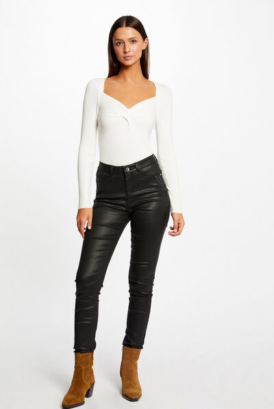 Pantalon slim enduit à détails cloutés noir femme