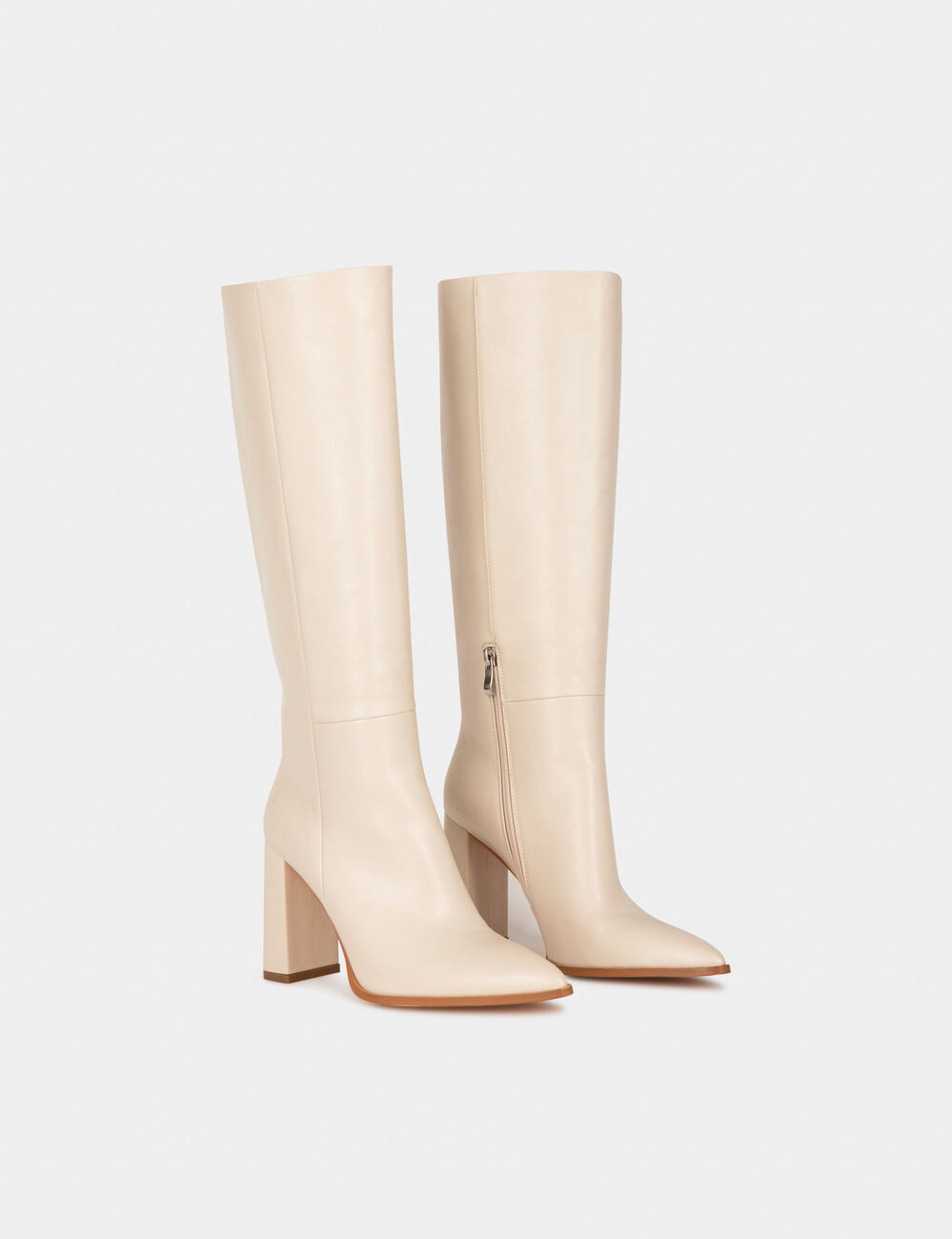 Bottes à talons et bouts pointus ivoire femme