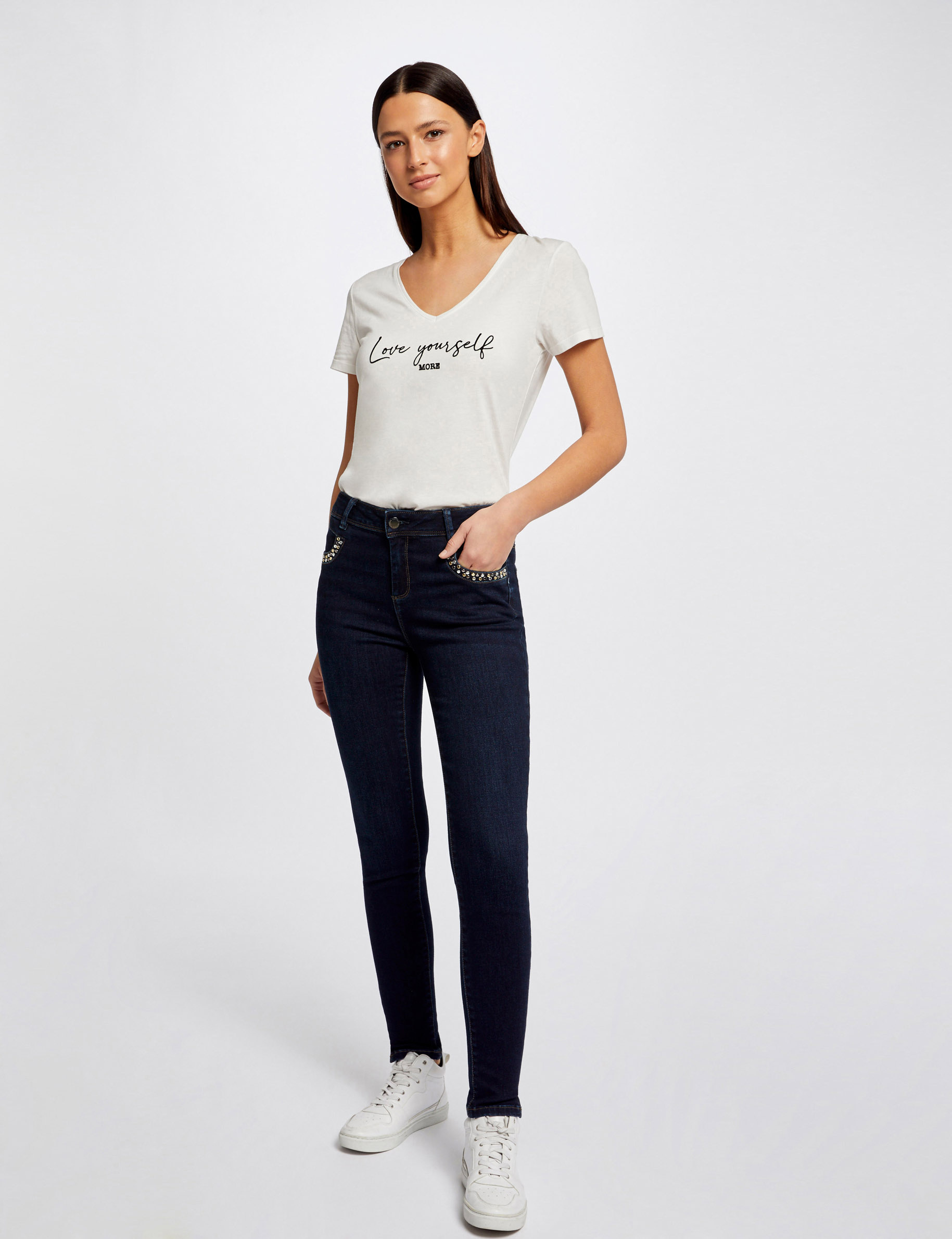 Jeans slim avec poches cloutées jean brut femme