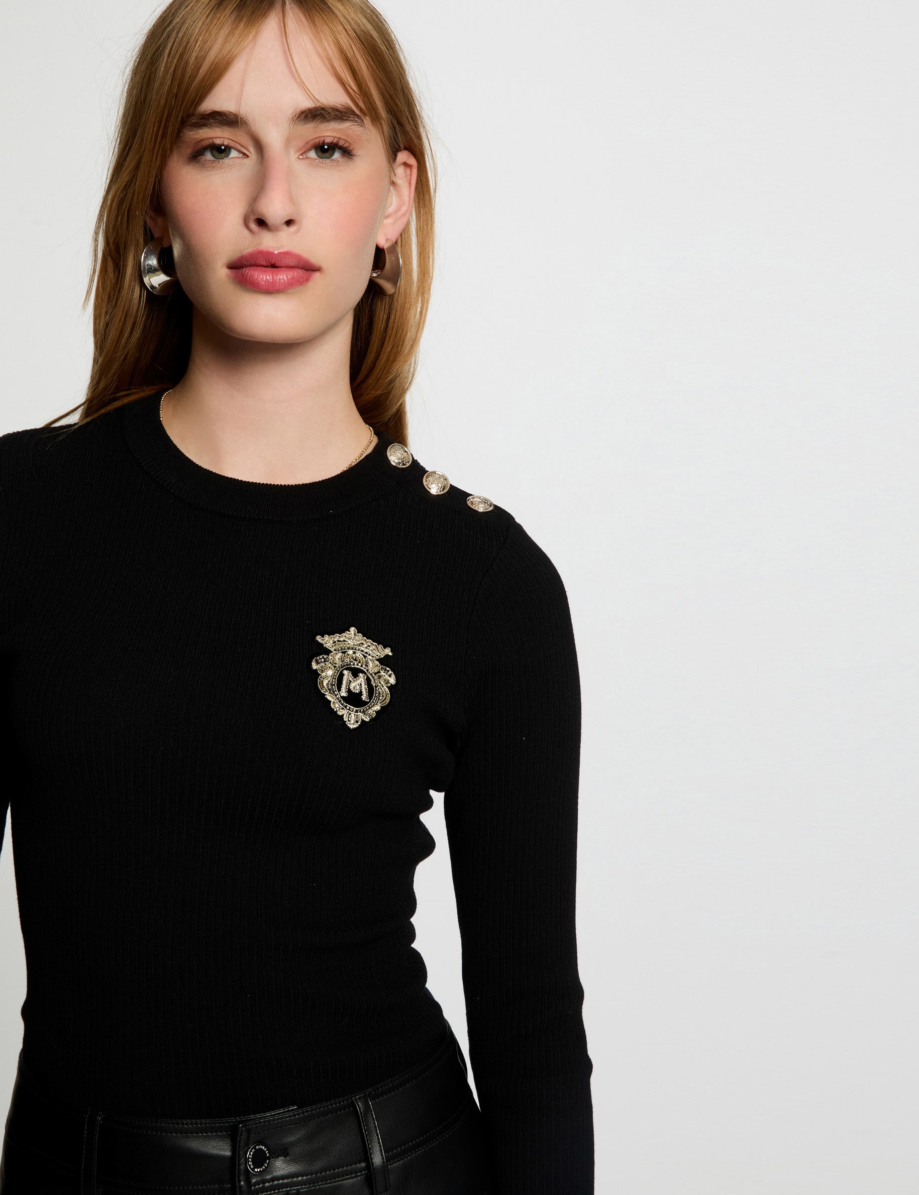 Pull col rond c&ocirc;tel&eacute; noir femme