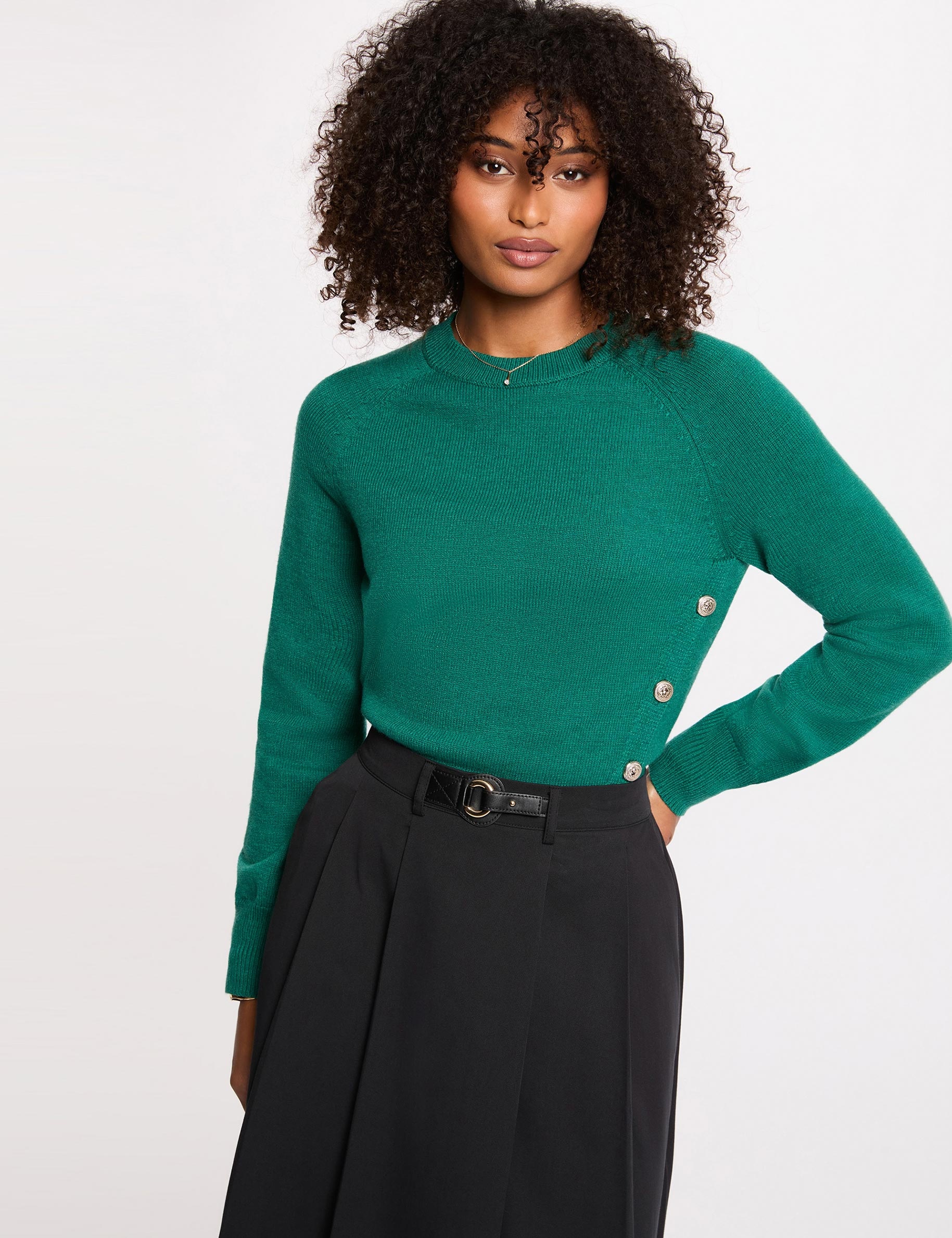 Pull à col en V et manches longues en tricot vert