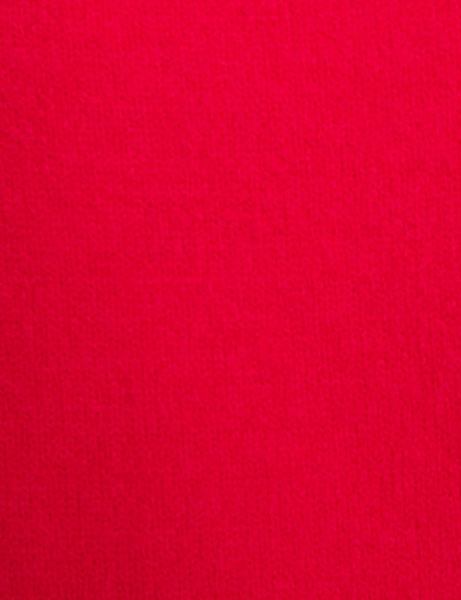 Pull asym&eacute;trique avec bijou rose vif femme